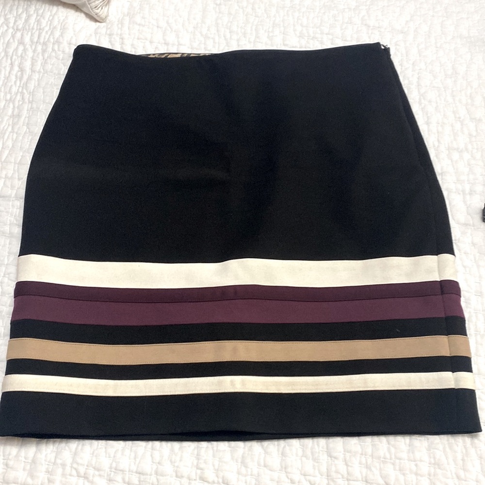 Black, off white,tan and maroon mini skirt.